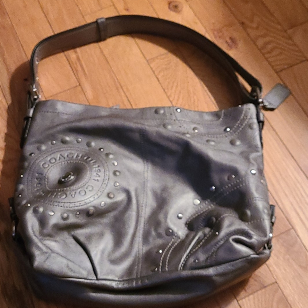 Hobo style coach bag silver in colour.